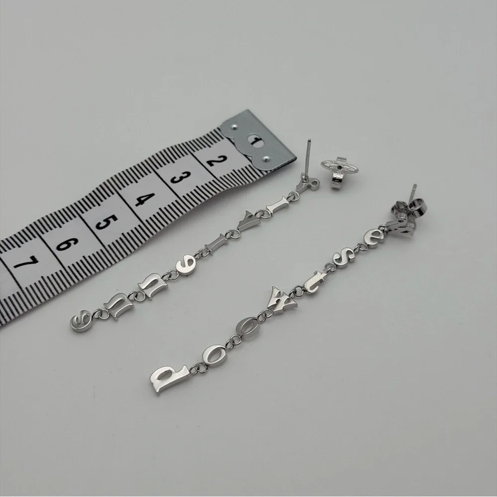 VIVIENNE WESTWOOD RAIMUNDA ASYMMETRICAL LETTER DROP EARRINGS – SILVER TONE - Picture 6 of 6